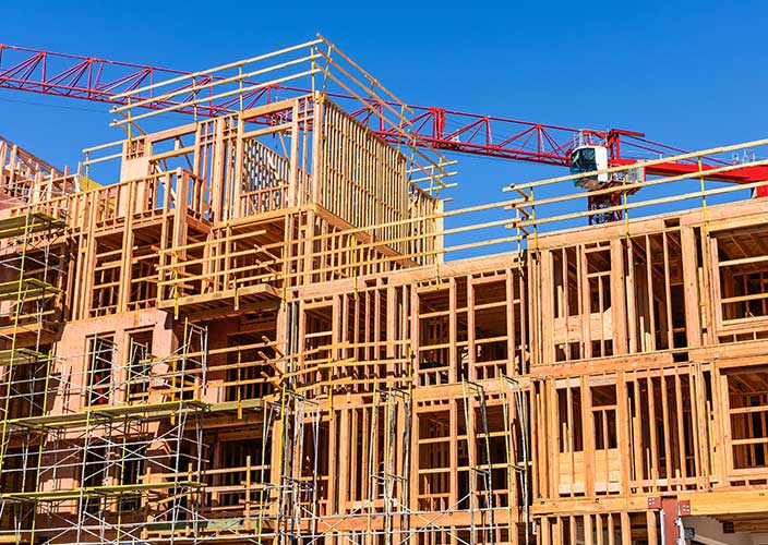 A multi-story apartment building under construction