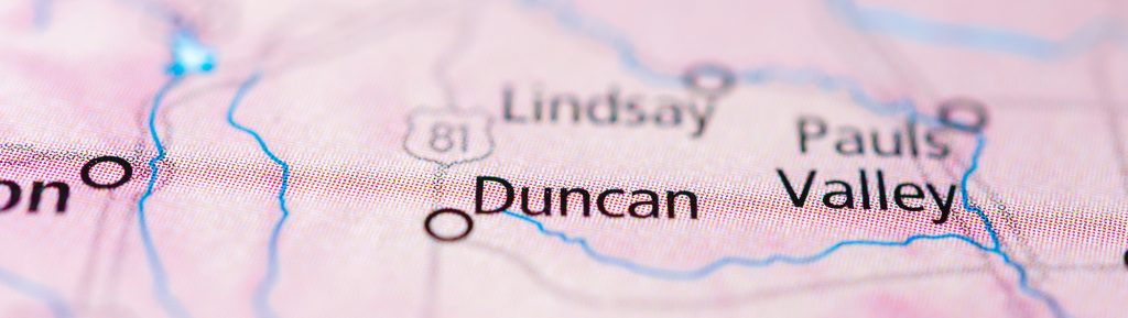 A map image shows the location of the small town of Duncan within Oklahoma