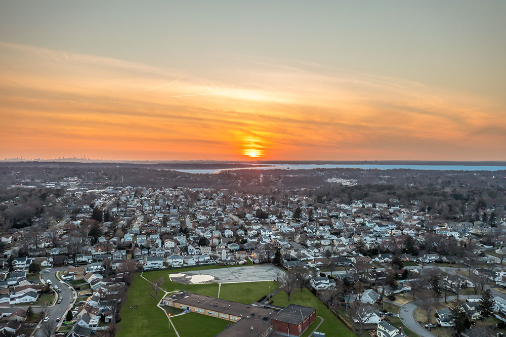 Aerial photo of homes, schools, and businesses in Glen Cove on Long Island, New York