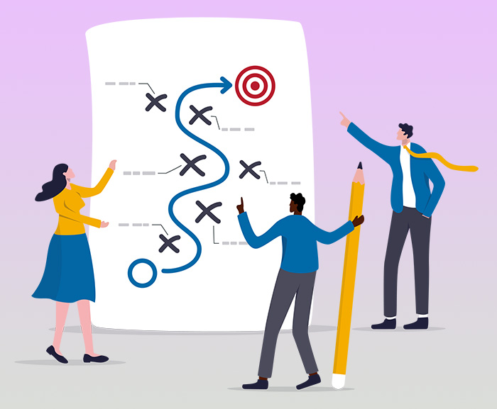 An illustration of three people standing in front of a strategic game plan drawing showing how to reach a target. They are pointing at the drawing an one of the people is holding a pencil.