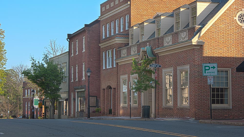Historical brick commercial buildings along a downtown street in Warrenton, Virginia