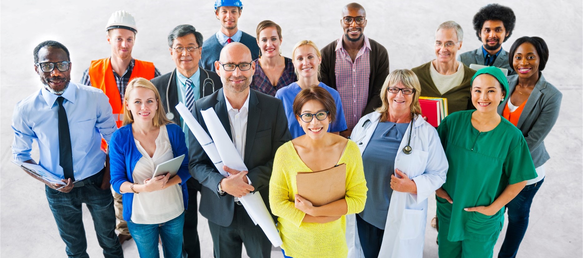 A diverse group of many different types of people working in different professions.